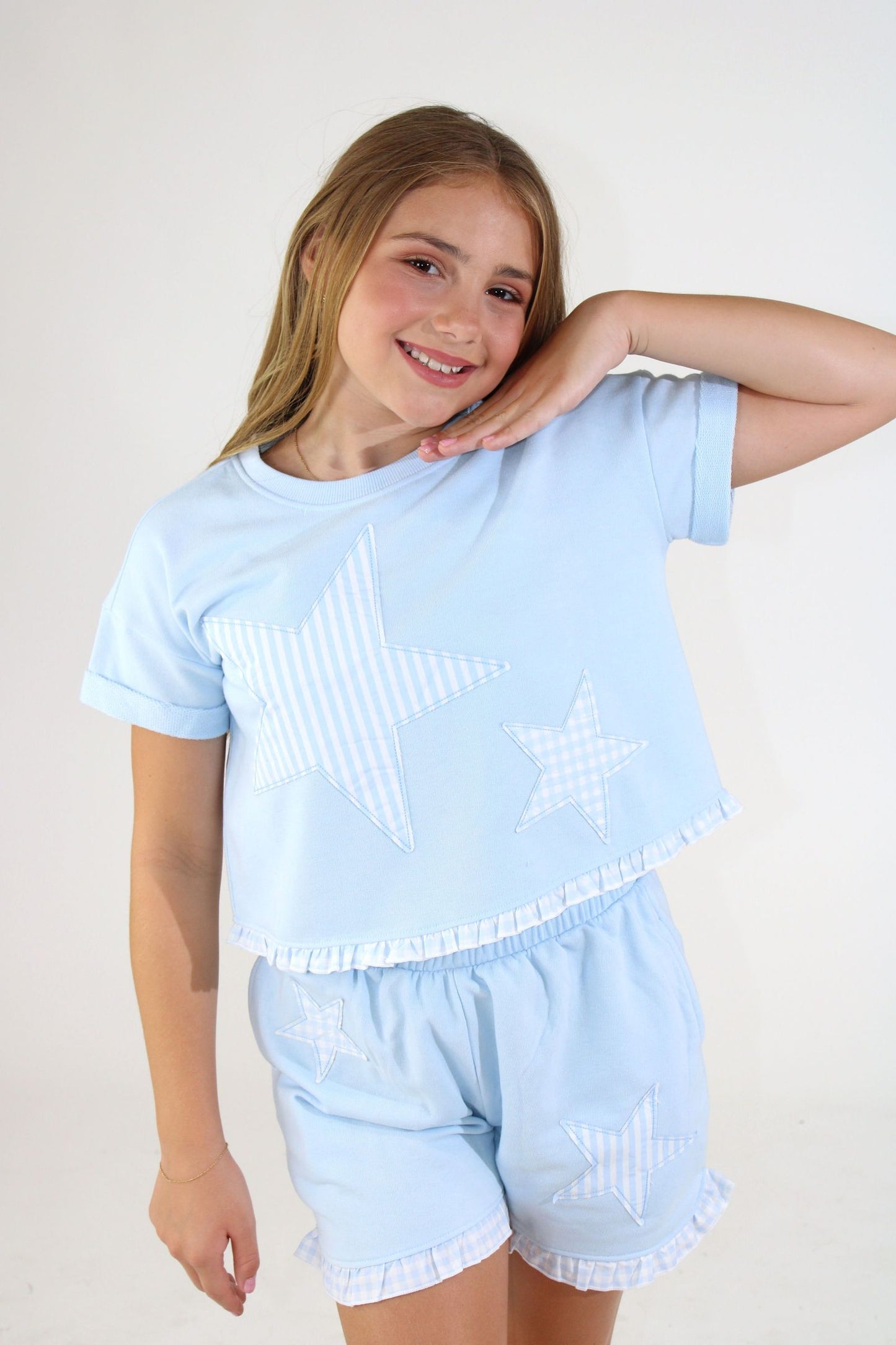 Star Applique Ruffle Hem Top