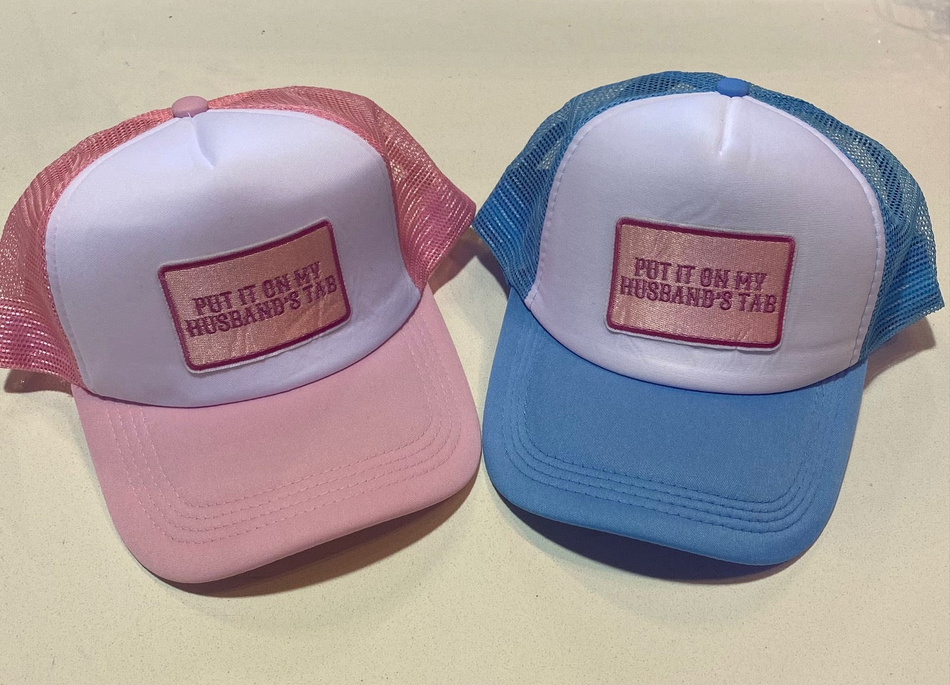 Put On My Husbands Tab Trucker Hat