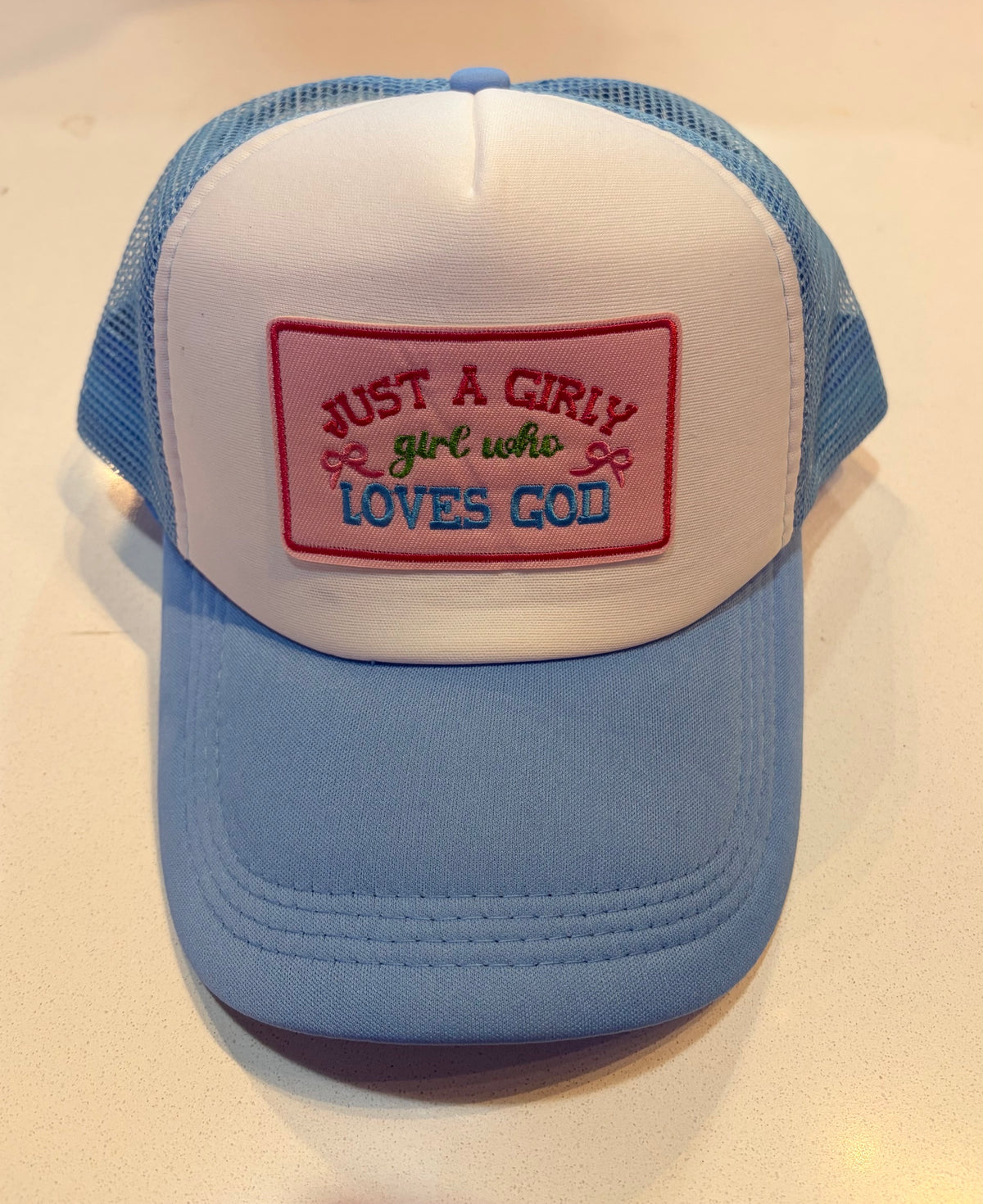 Just A Girly Girl Who Loves God Trucker Hat